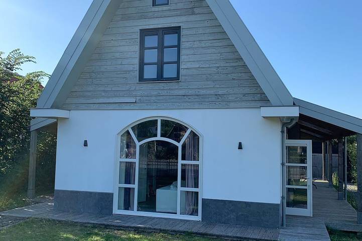 Ferienhaus für 5 Personen, mit Balkon und Garten