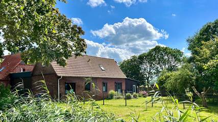 Ferienwohnung für 6 Personen, mit Terrasse und Garten sowie Ausblick in Nordenham