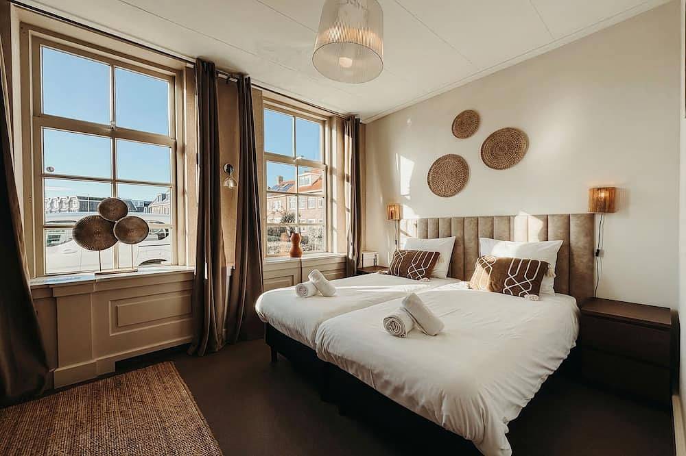 Geräumige Suite im Erdgeschoss in Zoutelande, ideal für Paare oder kleine Familien. Klimatisiert, eigenes Bad, babyfreundliche Annehmlichkeiten und in der Nähe von Strandterrassen und der Küste. in Zoutelande, Walcheren