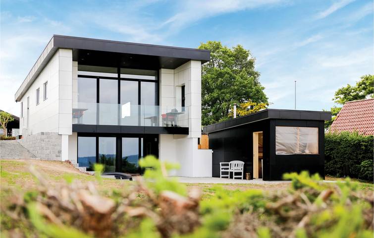 Ferienhaus für 6 Personen, mit Terrasse und Whirlpool sowie Garten in Mørkholt