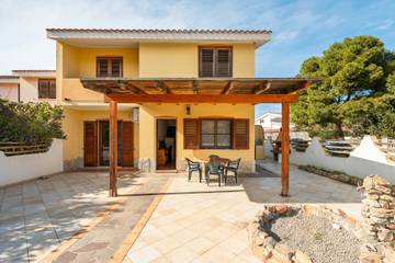 Gîte pour 4 personnes, avec jardin à Porto Pino