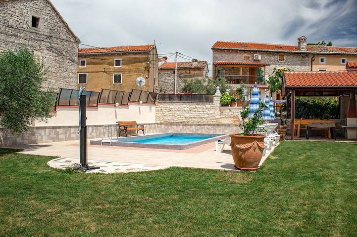 Ferienhaus für 4 Personen, mit Balkon und Garten