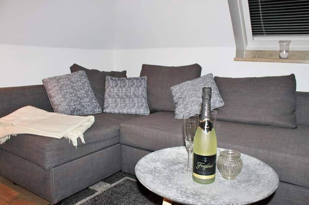 Entire apartment, Cozy 4-star vacation apartment on the top floor with a beautiful view of the St. Nikolai Church in Kappeln and its own terrace in the garden in Kappeln, Kappeln and surroundings
