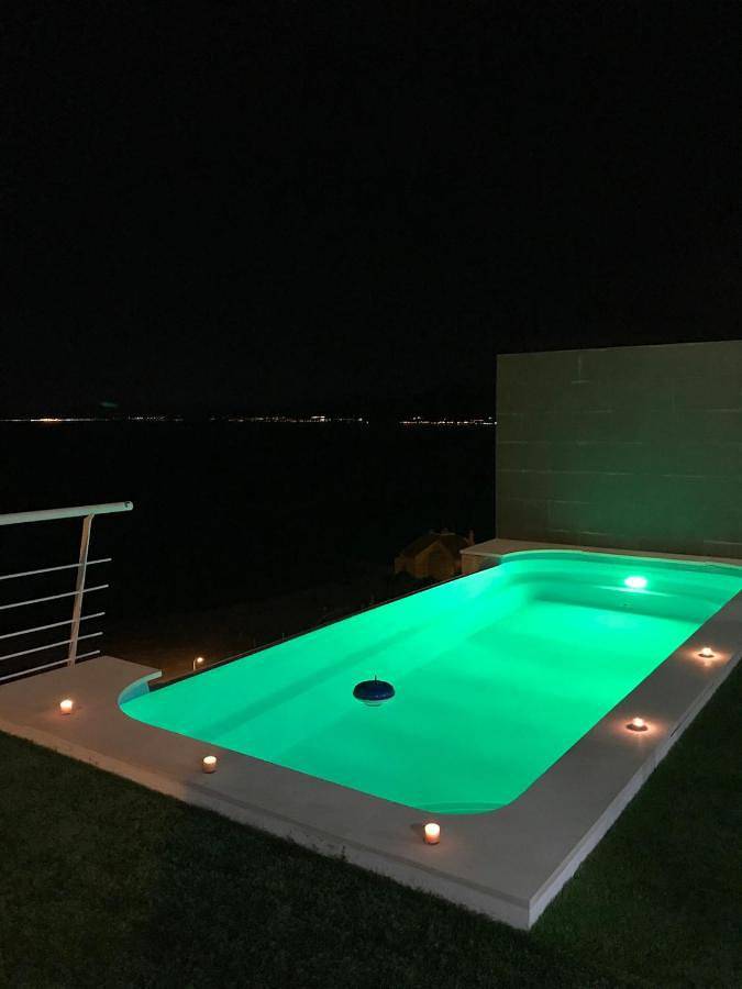 Villa conectada al mediterraneo, Infinity pool in Platja les Oliveres (Cullera), Cullera