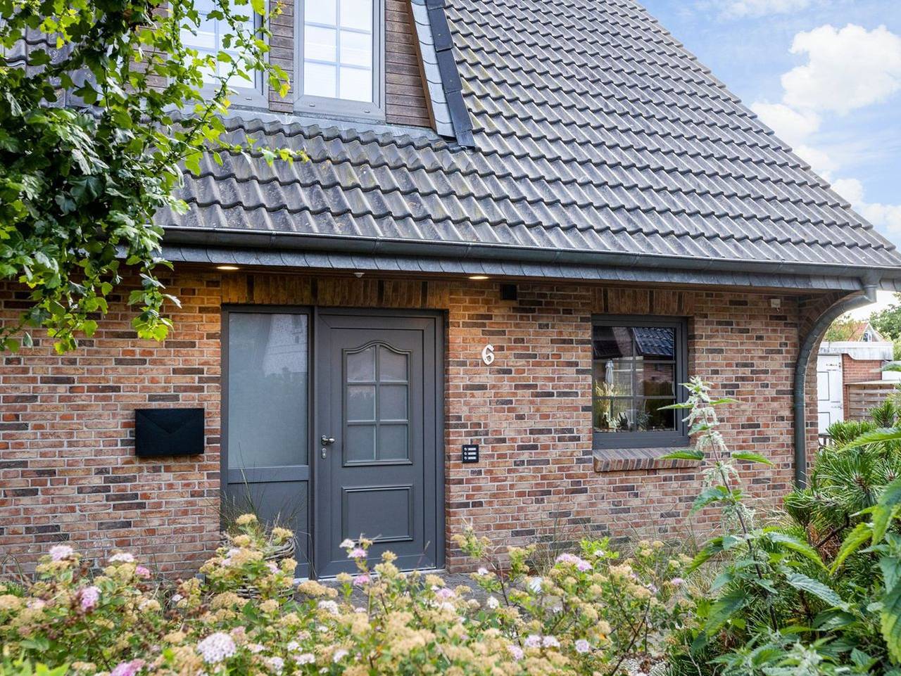 Ganze Ferienwohnung, Dünen Lodge - Moderne Erdgeschosswohnung mit großzügiger Terrasse und eigenem Garten in Tinnum, Sylt (Gemeinde)