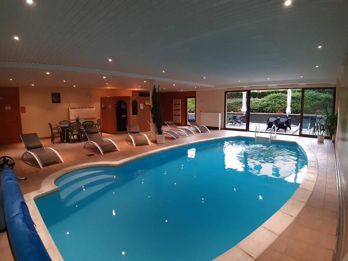 Appartement de vacances pour 6 personnes, avec Terrasse et Piscine ainsi que Sauna et Vue