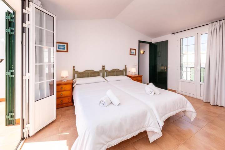 Location de vacances pour 3 personnes, avec jardin et bassin pour enfant ainsi que vue et piscine à Fornells - 3