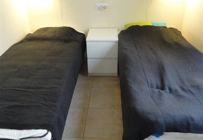 Casa de vacaciones 'Casa de Sonrisa' con piscina compartida, Wi-Fi, jardín y terraza in Las Calas, Torrevieja