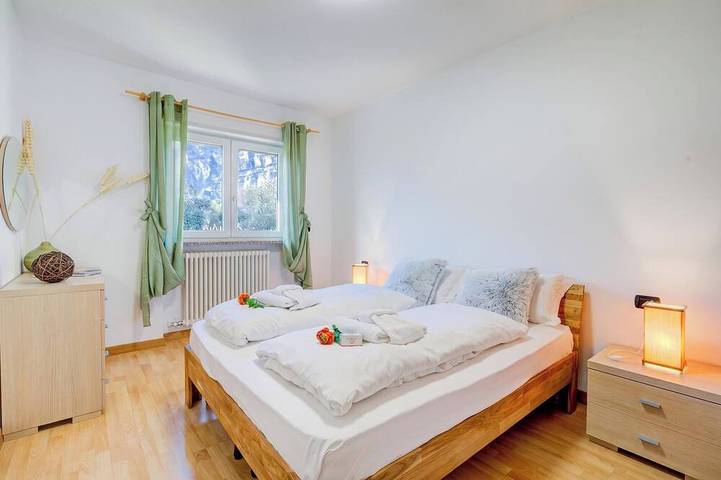 Entire apartment, Agritur Laura - L'angolo dei Fiori 4 with Shared Garden, Torbole sul Garda, Italy in Torbole, Nago-Torbole