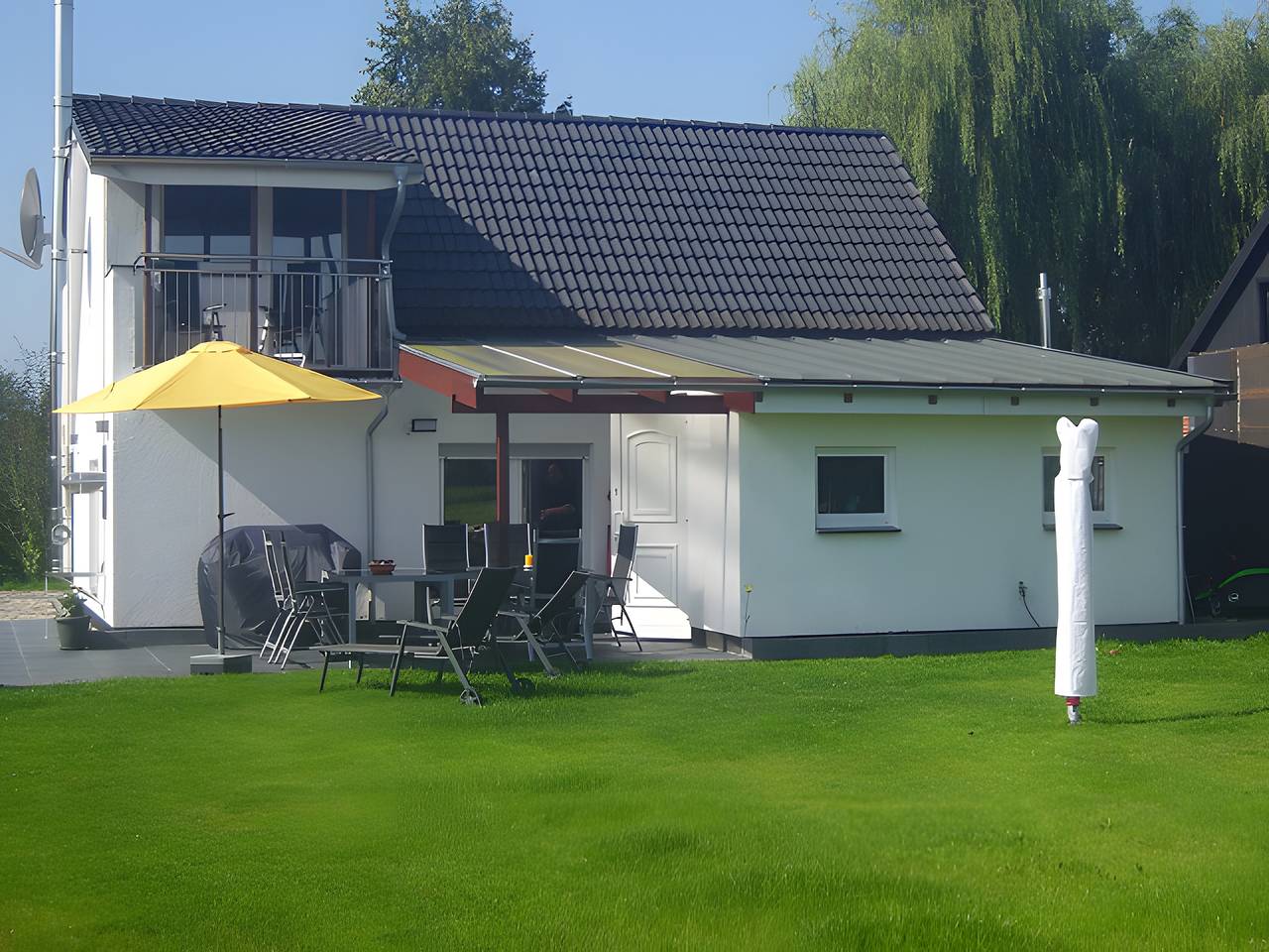 Ferienhaus 'Kudensee' mit Gemeinschaftsterrasse, privatem Garten und Wlan in Kudensee, Nord-Ostsee-Kanal