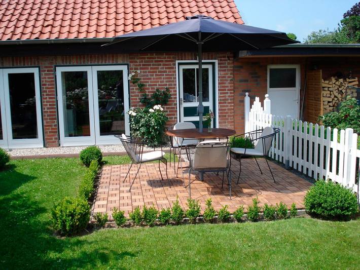 Ferienwohnung für 3 Personen, mit Terrasse und Garten sowie Pool und Sauna