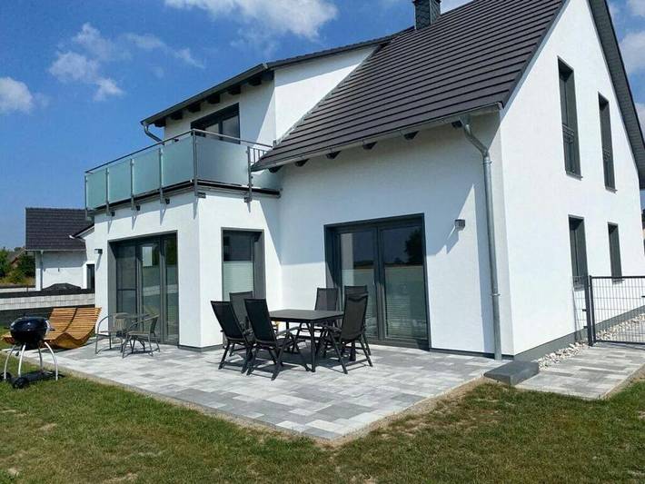 Ferienhaus für 8 Personen, mit Balkon und Terrasse sowie Garten und Sauna