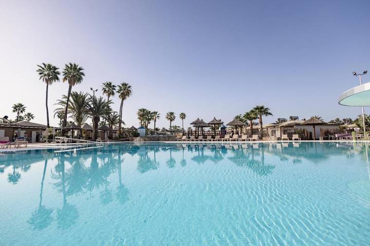 Bungalow para 2 personas, con jardín además de piscina para niños y piscina en Sonnenland