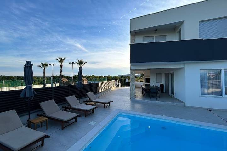 Ferienhaus für 12 Personen, mit Whirlpool und Garten sowie Balkon und Sauna