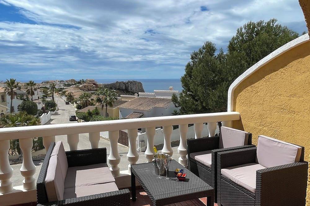 Eckhaus mit Garten, Meersicht & Gemeinschaftspool. Wifi & Haustierfreundlich! in La Cumbre del Sol, Poble Nou de Benitatxell