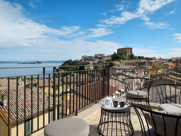Ferienhaus für 12 Personen, mit Balkon und Terrasse sowie Seeblick am Bolsenasee