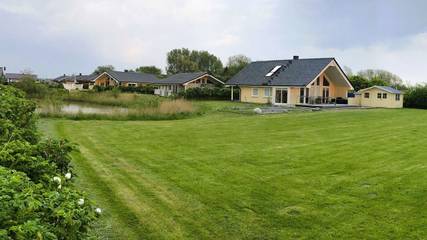 Ferienhaus für 6 Personen, mit Terrasse und Whirlpool sowie Sauna und Garten, mit Haustier in Wesselburenerkoog