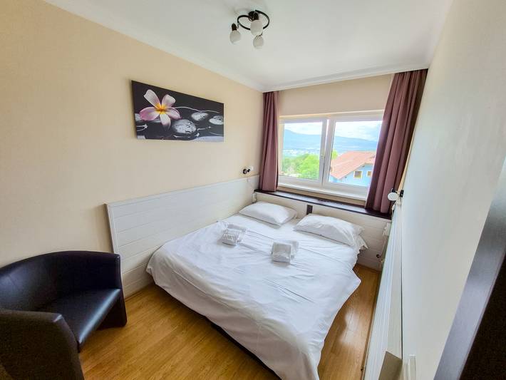 Ferienwohnung für 3 Personen, mit Balkon und Garten sowie Sauna und Seeblick am Faaker See - 3