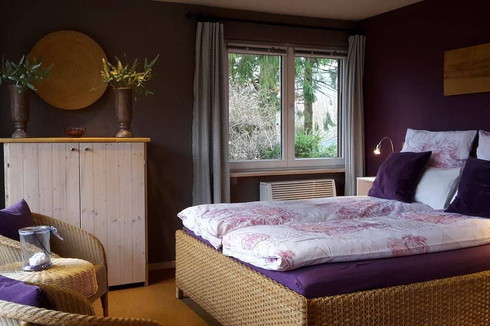 Ferienhausanlage Hilkenberg: Haus 3 mit Kaminofen u. wildromantischem Garten in Bodenfelde, Weserbergland