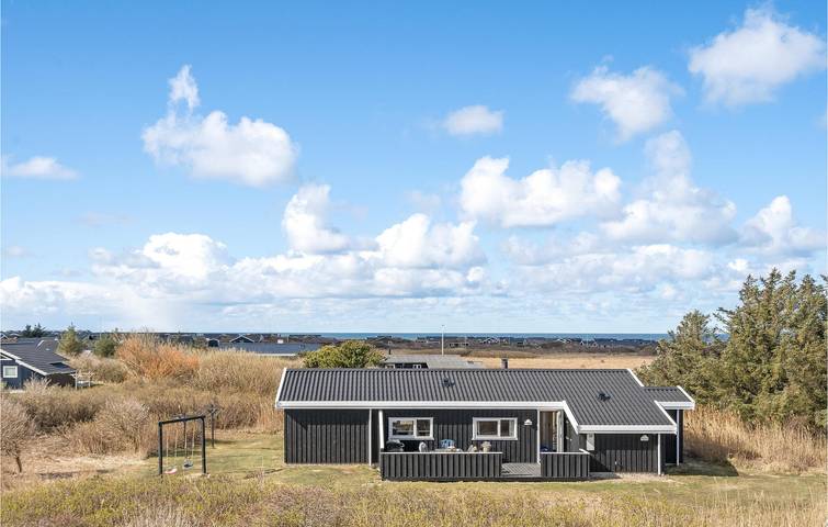 Ferienhaus für 8 Personen, mit Terrasse und Whirlpool sowie Garten und Sauna in Nørlev Strand