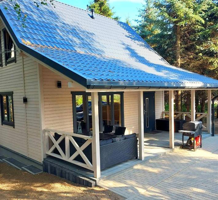 Dom dla 9 osób, z Balkon i Jacuzzi oraz Taras i Ogród w Ostróda