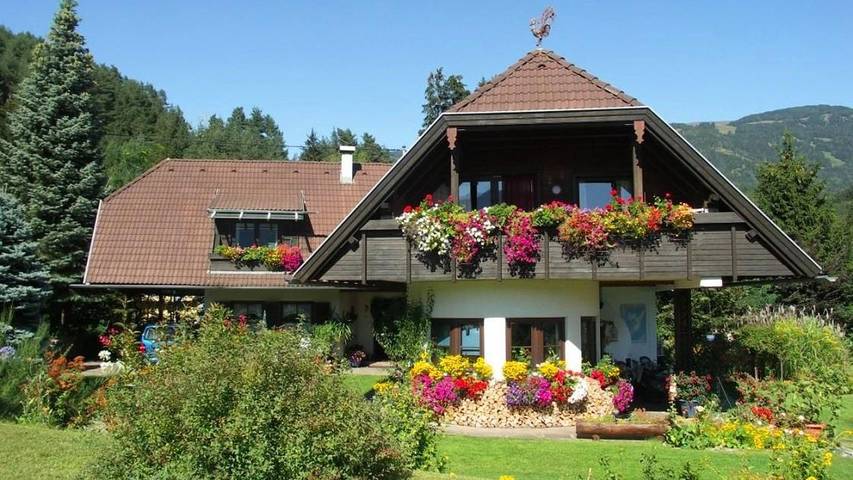 Ferienwohnung für 4 Personen, mit Garten und Seeblick sowie Balkon und Ausblick, kinderfreundlich in Seeboden