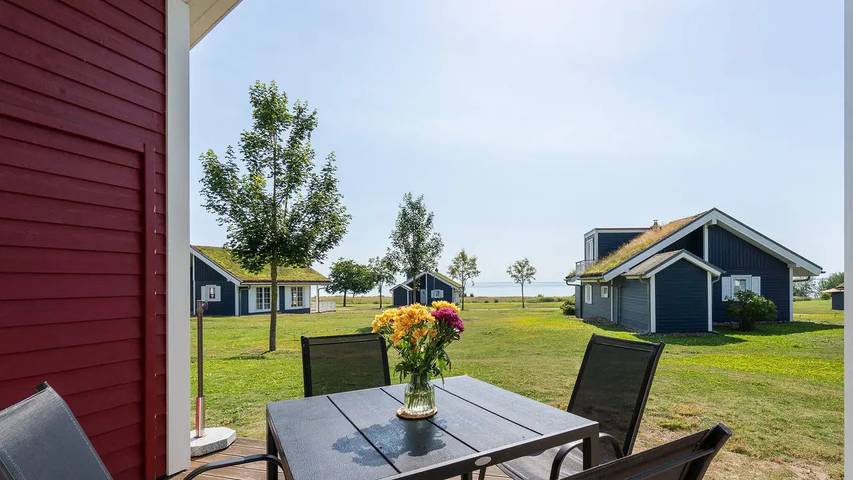 Ferienhaus mit Meerblick für 4 Personen, mit Balkon und Sauna sowie Garten