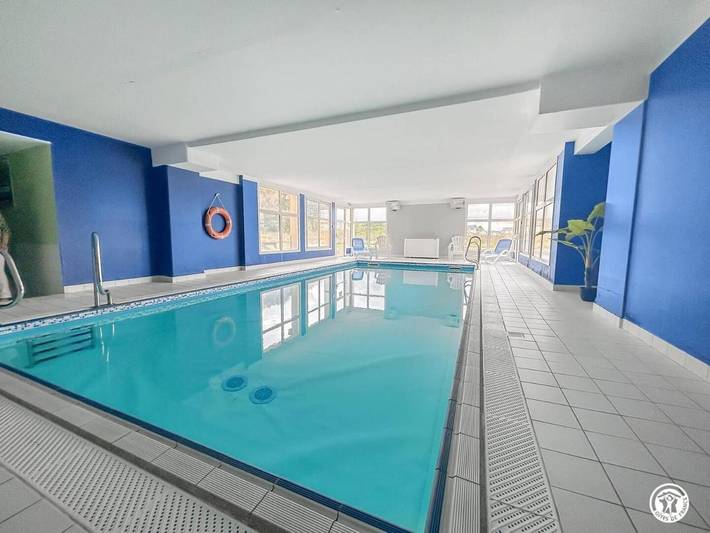 Appartement de vacances pour 4 personnes, avec piscine et sauna ainsi que jardin et terrasse