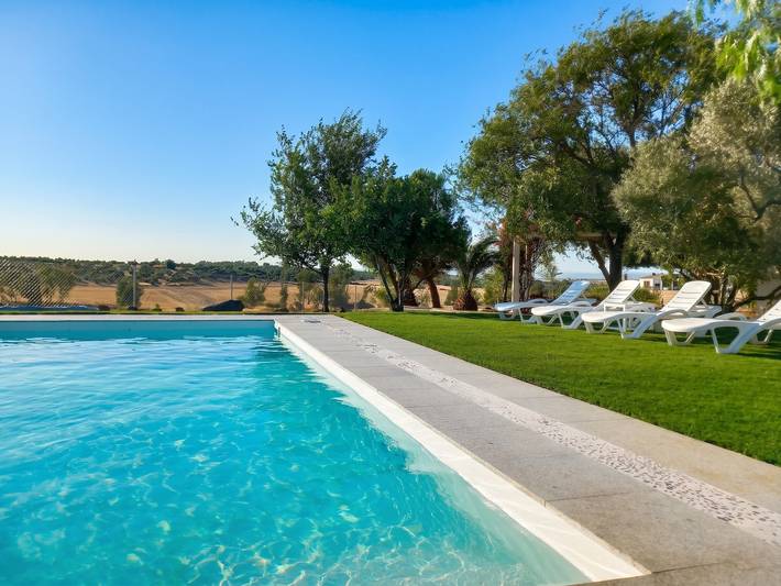 Location de vacances pour 10 personnes, avec Terrasse ainsi que Jardin et Piscine dans la Province de Séville