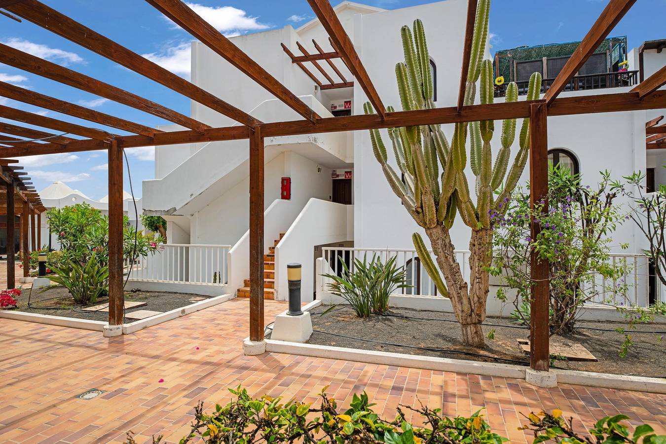Appartement entier, Charmant appartement en duplex, avec vue mer, piscine et Wi-Fi in Costa Teguise, Teguise