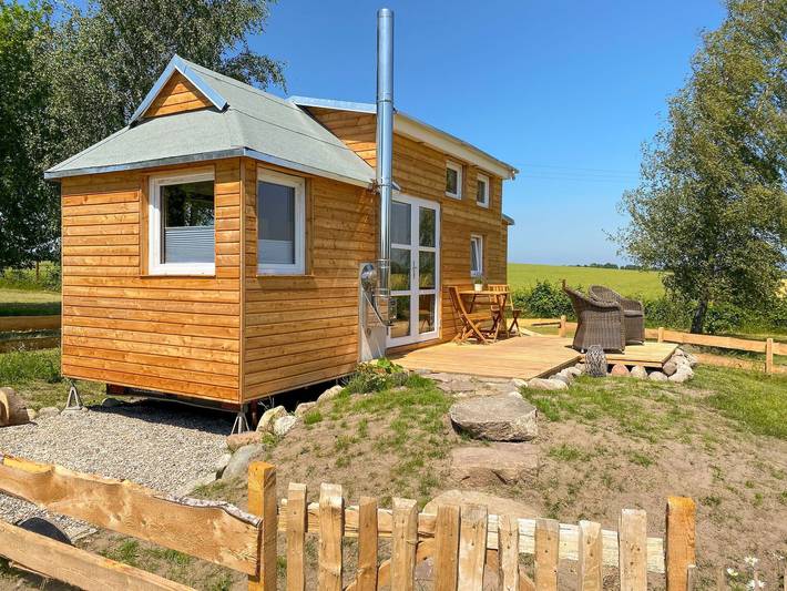 Ferienhaus für 3 Personen, mit Terrasse und Garten sowie Seeblick und Ausblick