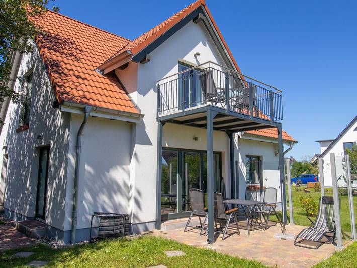 Ferienhaus für 4 Personen, mit Garten und Balkon sowie Seeblick und Ausblick, kinderfreundlich in Kröslin - 3