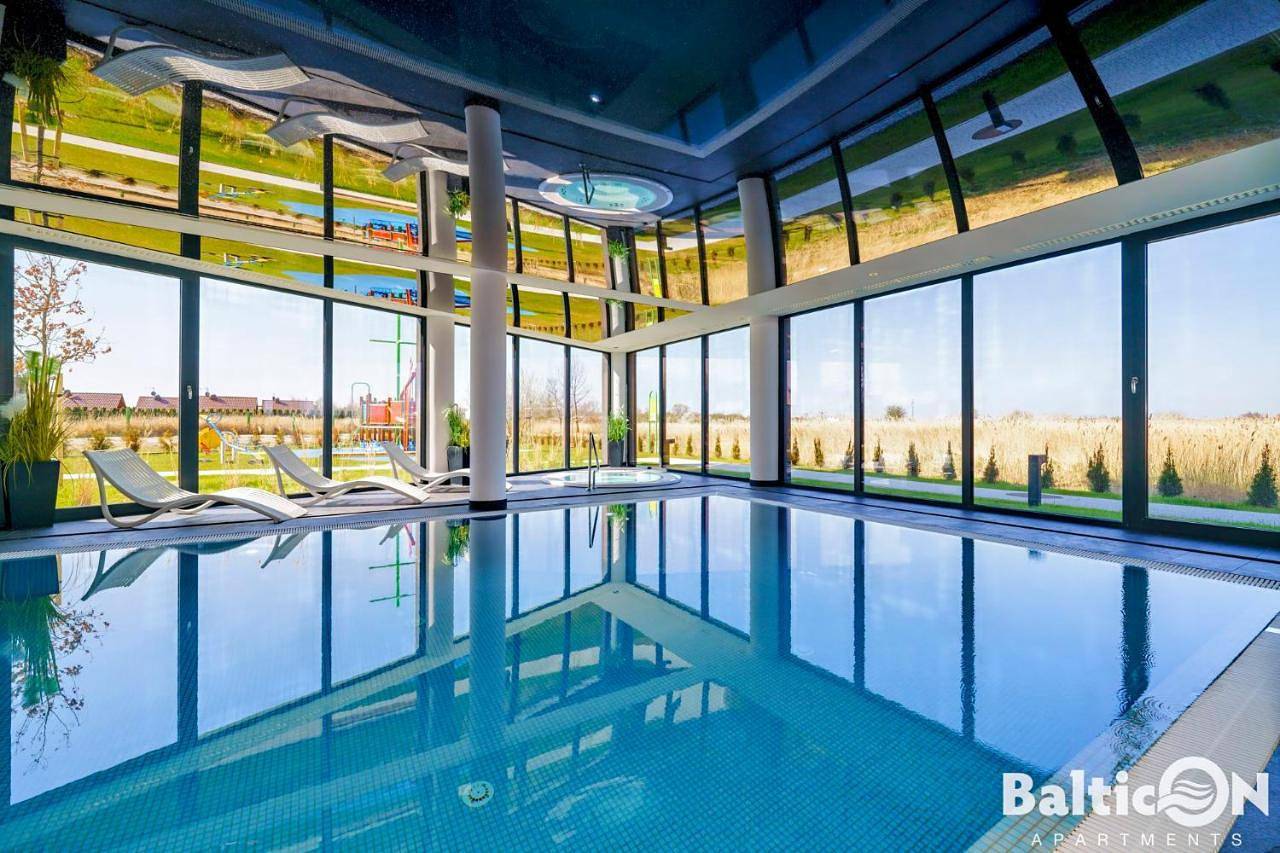 Apartamenty Balticon Westin House -luksusowy 70m2 , basen pool, sauna, parking inklusive in Kołobrzeg, Baltic Sea Pomerania