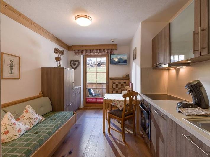 Ferienwohnung für 2 Personen, mit Pool und Sauna sowie Garten, kinderfreundlich in Wilder Kaiser