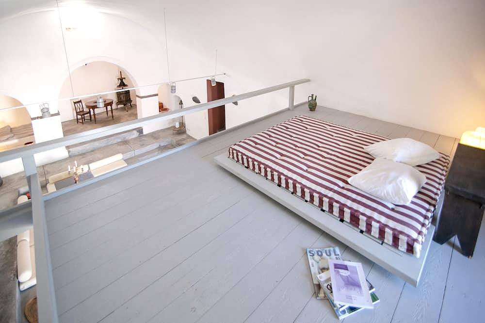 The Red Winehouse | Old winery converted into a stylish villa | close to Oia in Finikia, Santorin
