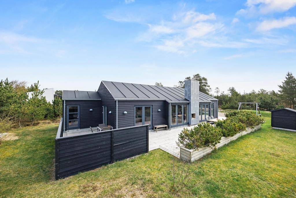 Luxusferienhaus mit Aktivitätsraum und Whirlpool in Henne, Filsø See