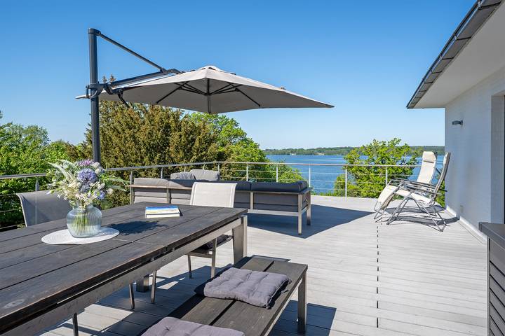 Ferienhaus für 7 Personen, mit Balkon und Terrasse sowie Garten und Sauna in Bosau