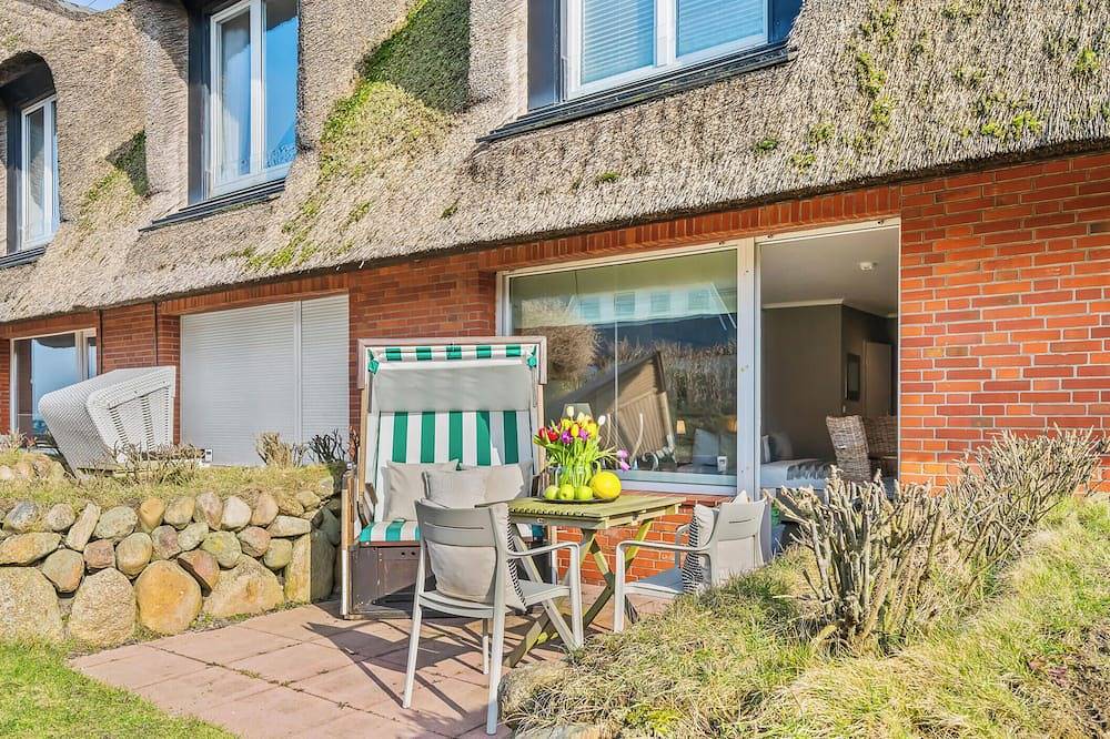 Ganze Wohnung, Charmante Ferienwohnung im Haus Kampbarg in Kampen mit Terrasse und Meerblick in Kampen (Sylt), Sylt