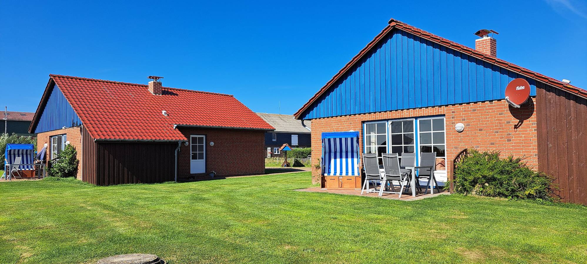 'Ferienhaus Wellengang' mit Gemeinschaftsgarten und Wi-Fi in Pellworm, Nordseeküste