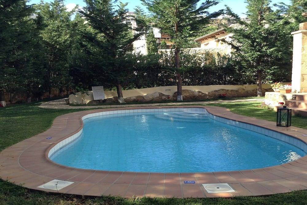 Villa Melody de Rock House (2 habitaciones, capacidad para 4) con jardín privado y piscina. in Platanias, Region de Chania