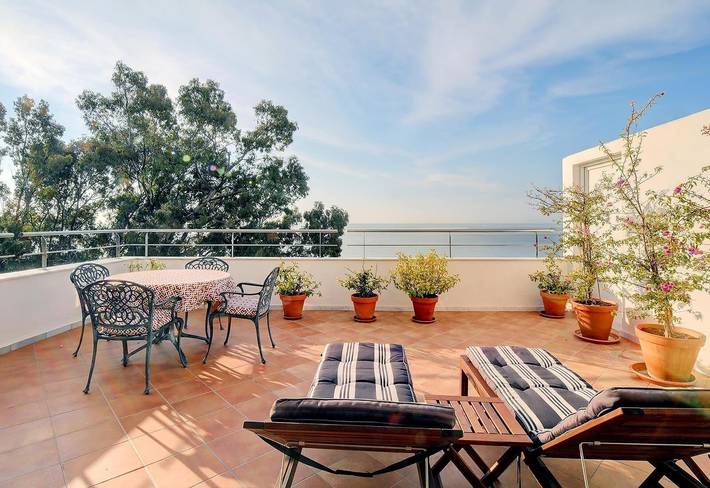 Ferienwohnung für 4 Personen, mit Balkon und Garten sowie Kinderpool in Estepona