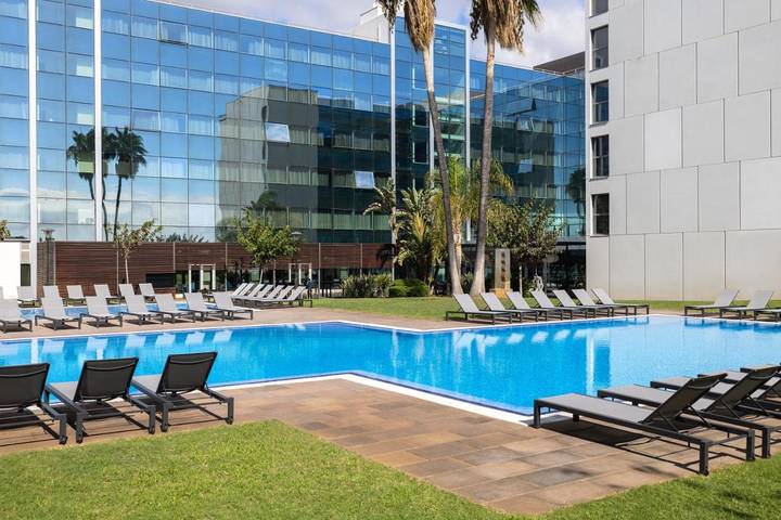 Hôtel pour 3 personnes, avec bassin pour enfant et jardin ainsi que sauna et piscine