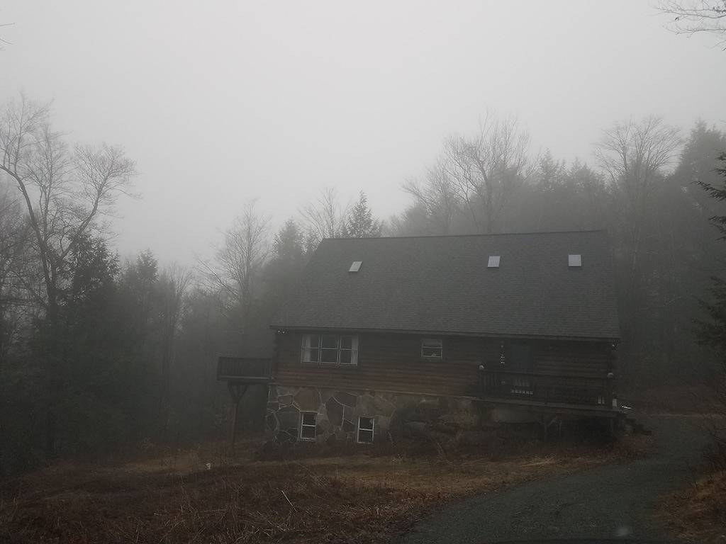 Secluded modern log cabin with picturesque private water fall on 12 acres! in Sullivan County