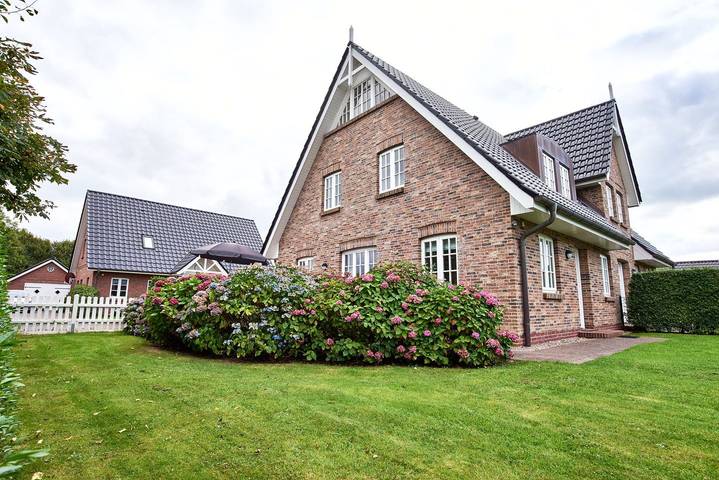 Ferienhaus für 6 Personen, mit Terrasse und Garten sowie Sauna und Ausblick in Oldsum
