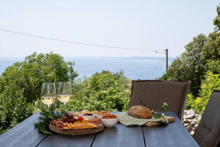 Ferienhaus für 6 Personen, mit Balkon und Terrasse sowie Garten und Ausblick