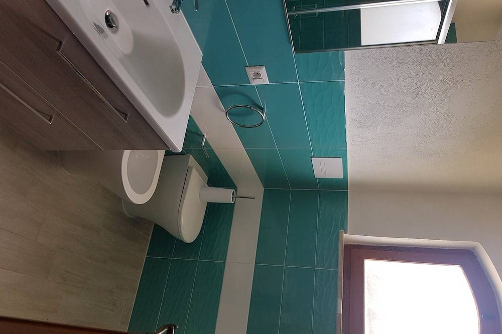 Hel lejlighed, Attic with sea view just 30 meters from the beaches with parking space in the courtyard! in Cala Gonone, Dorgali