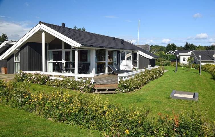 Ferienhaus für 6 Personen, mit Terrasse und Whirlpool sowie Garten und Sauna in Mommark