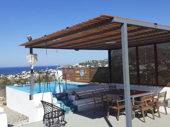 Gîte pour 4 personnes, avec piscine ainsi que vue et jardin, animaux acceptés dans Panormos - 4