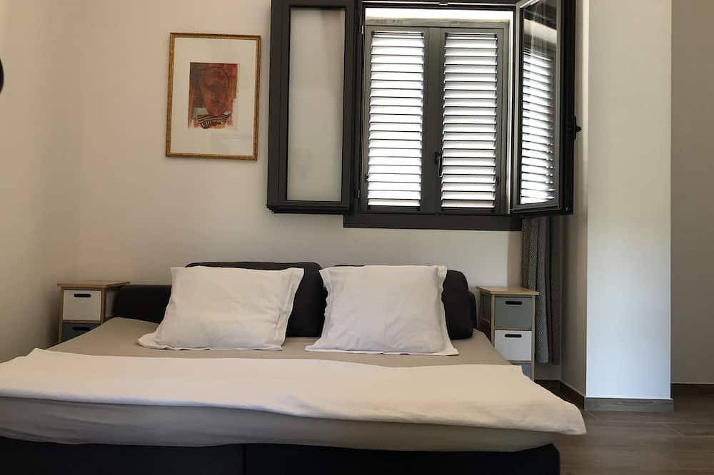 Appartement entier, Logement au centre d’une oliveraie a l’étage d’une villa, vallée du Regino in Ville-di-Paraso, Région de Calvi