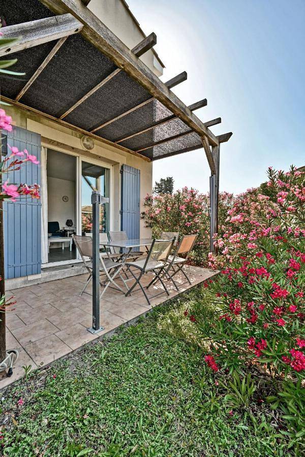 Appartement de vacances pour 6 personnes, avec Terrasse ainsi que Jardin et Piscine